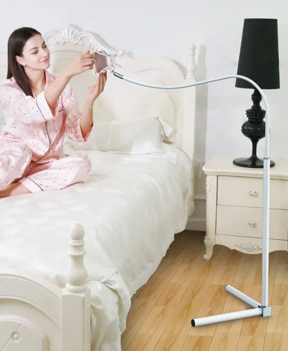 Mobile phone bed bracket with overhead shelf for bedside TV viewing in black and white colour options