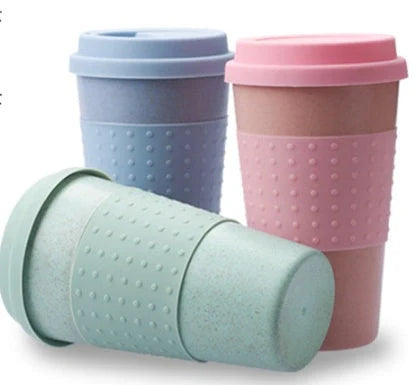Eco-friendly wheat straw silicone coffee cup with lid in green, pink, and blue