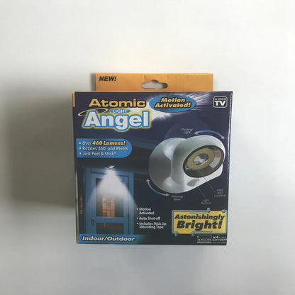 White angel design induction night light on table showing dimensions