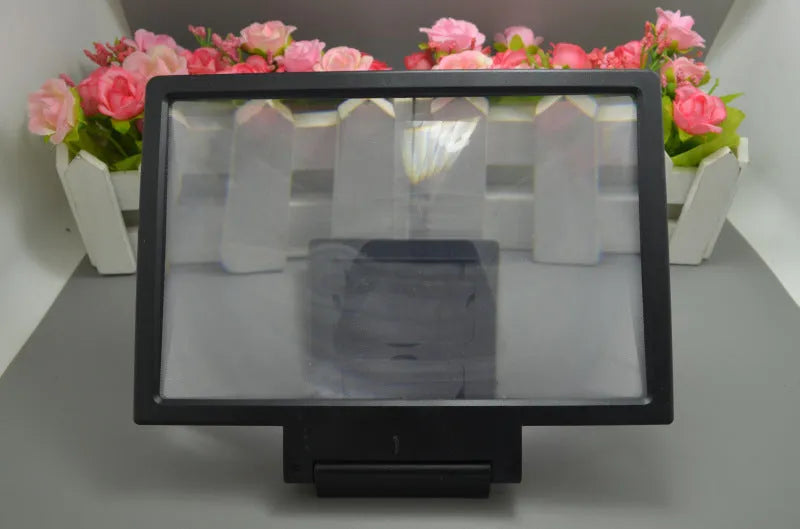 Black and white portable screen amplifier for mobile phones, 18cm long.