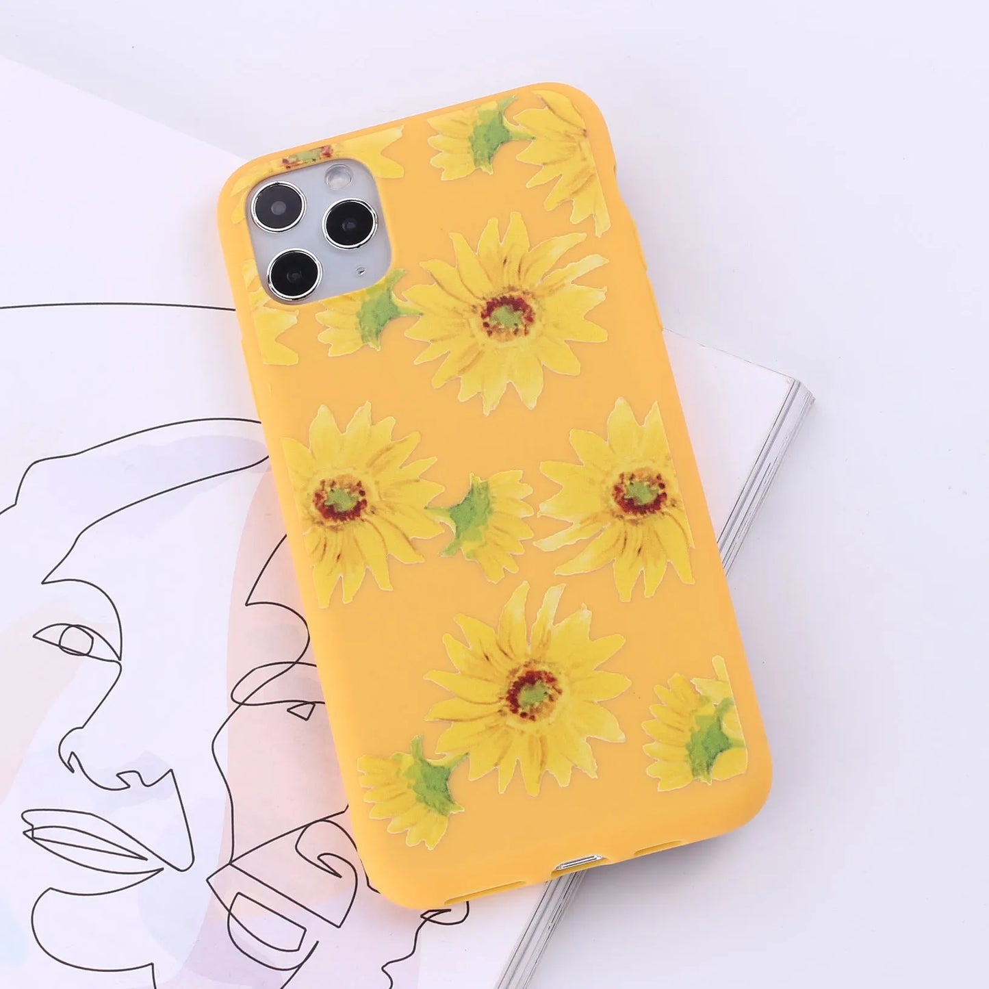 A selection of colourful TPU back cover cases for various Apple iPhone models.