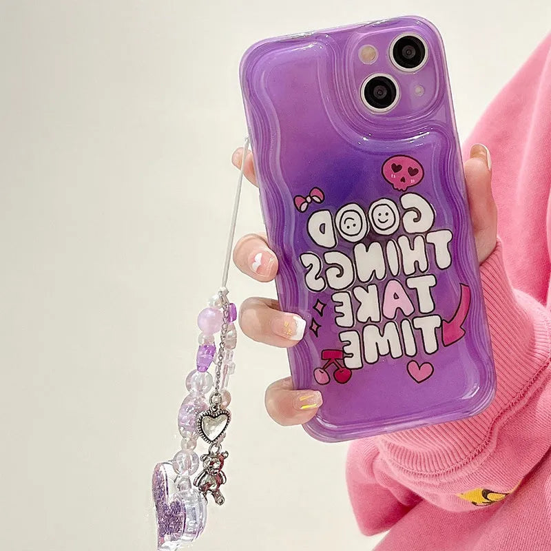 Purple graffiti love design iPhone 14 case with wrist chain attachment point and TPU bumper protection