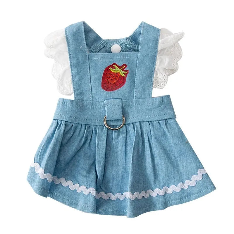Strawberry print denim-style dog skirt in Bondi Blue colour on a small dog