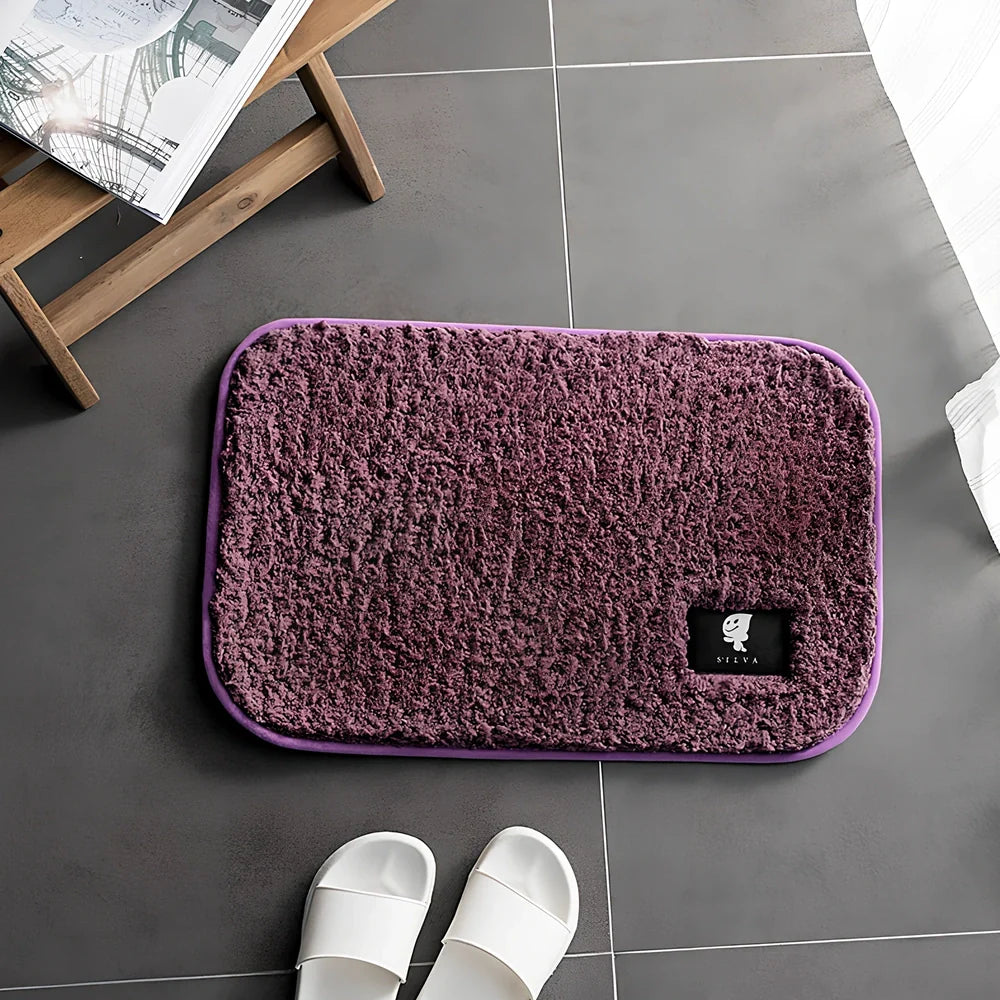 Rectangular anti-slip bathroom mat with polyester fibre construction in multiple colour options