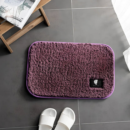 Rectangular anti-slip bathroom mat with polyester fibre construction in multiple colour options