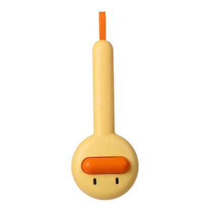 Small yellow duck-shaped plastic comb for grooming cats and dogs, with open needle teeth.