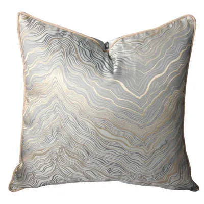 Corrugated stripe and diamond pattern cushion covers in green, blue, grey, and beige colours.
