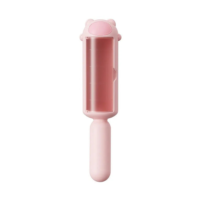 Pet hair remover tool in blue, pink, or yellow with self-cleaning base for removing dog and cat fur from furniture