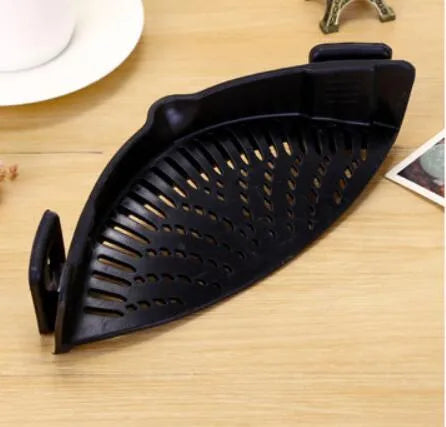 Silicone clip-on pot strainer in multiple colours for draining liquids, with buckle design and uniform hollow pattern