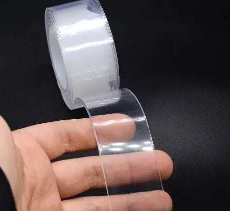 Roll of washable PU nano gel double-sided adhesive tape in various width options on a white background.
