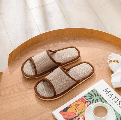 Women's open-toe linen slippers with thick sole in light brown colour.