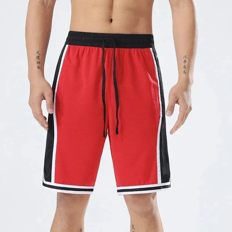 Men's straight-leg polyester sports training shorts in a grey colour, shown on a model.