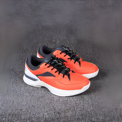 Orange men's wide fit tennis shoes with suede and mesh upper, lace-up closure, and rubber outsole.
