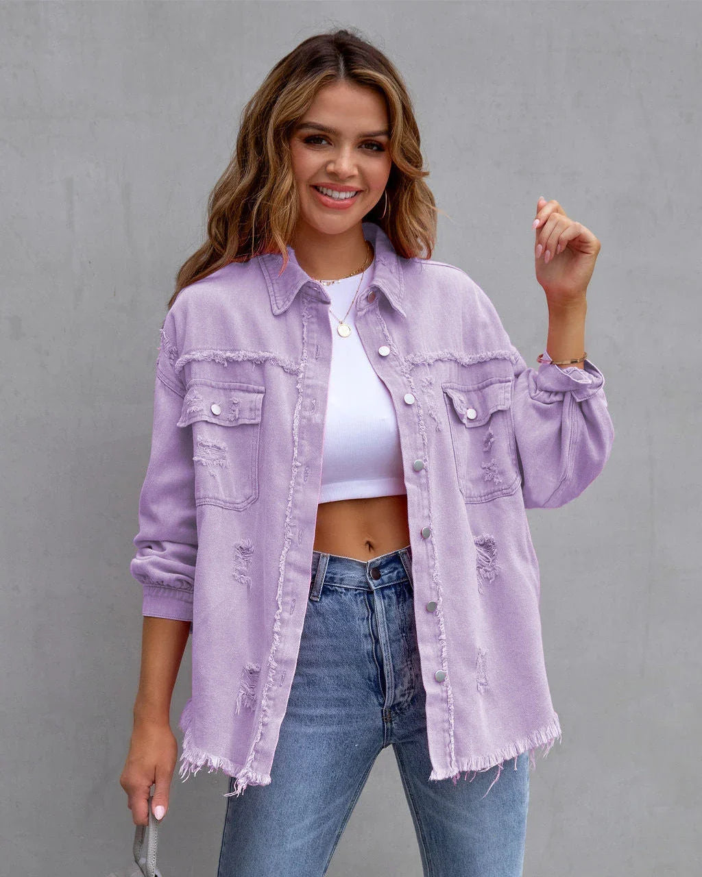 Stylish ripped denim jacket for trendy women in a variety of vibrant colors