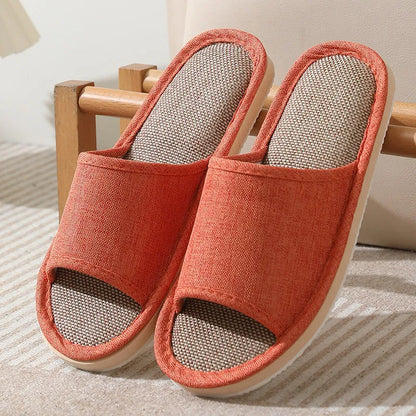 Women's open-toe linen slippers with thick sole in light brown colour.