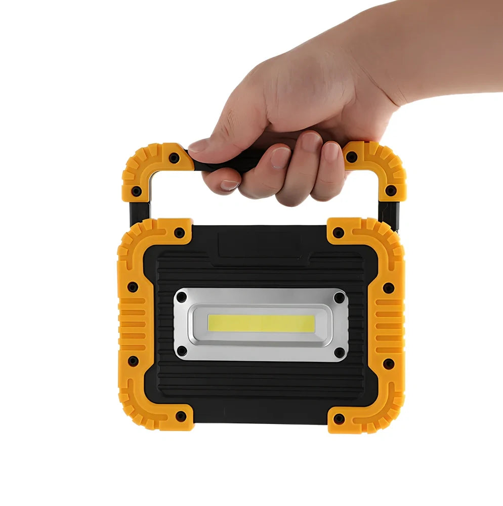 LED camping lantern with rotatable support showing USB ports and battery indicator