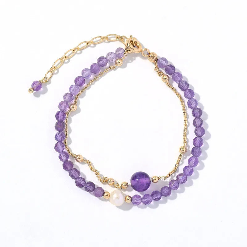 Amethyst coloured Chinese-style crystal bracelet with a diamond-shaped design and electroplated finish.