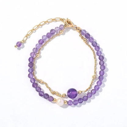 Amethyst coloured Chinese-style crystal bracelet with a diamond-shaped design and electroplated finish.