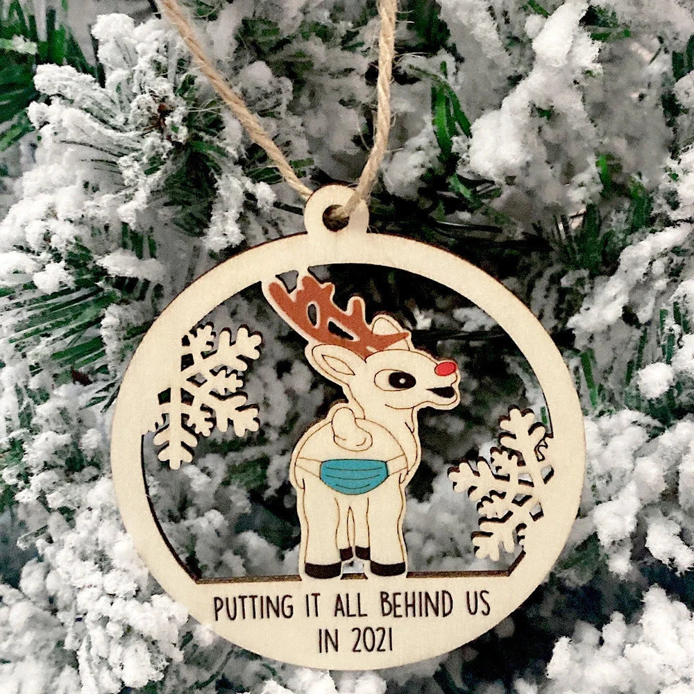 Laser-cut wooden Christmas tree pendant with lovers, snowman, and deer designs