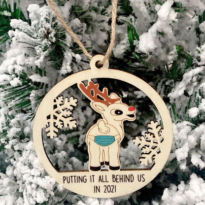 Laser-cut wooden Christmas tree pendant with lovers, snowman, and deer designs