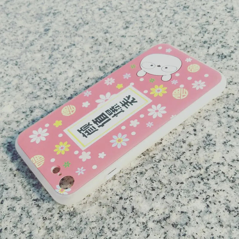 Clear TPU smartphone case with a custom design on the back, shown fitting an iPhone.