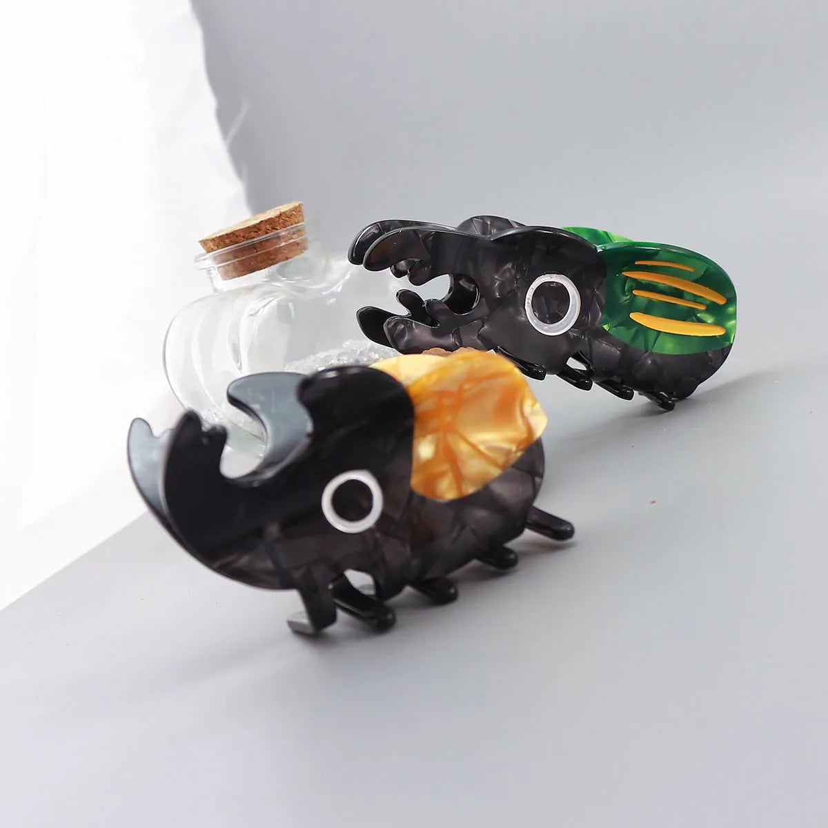 Handmade cellulose acetate beetle grip with caterpillar element in cartoon style decorative clip