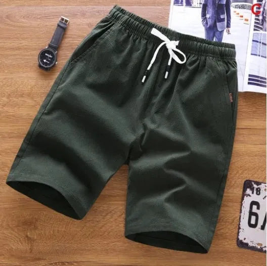Men's summer shorts wholesale in thin cotton fabric with lace-up placket and middle-waist fit, available in sizes from M to 5XL in black, blue, green, khaki, orange, red, and white colours, casual trousers for warm weather