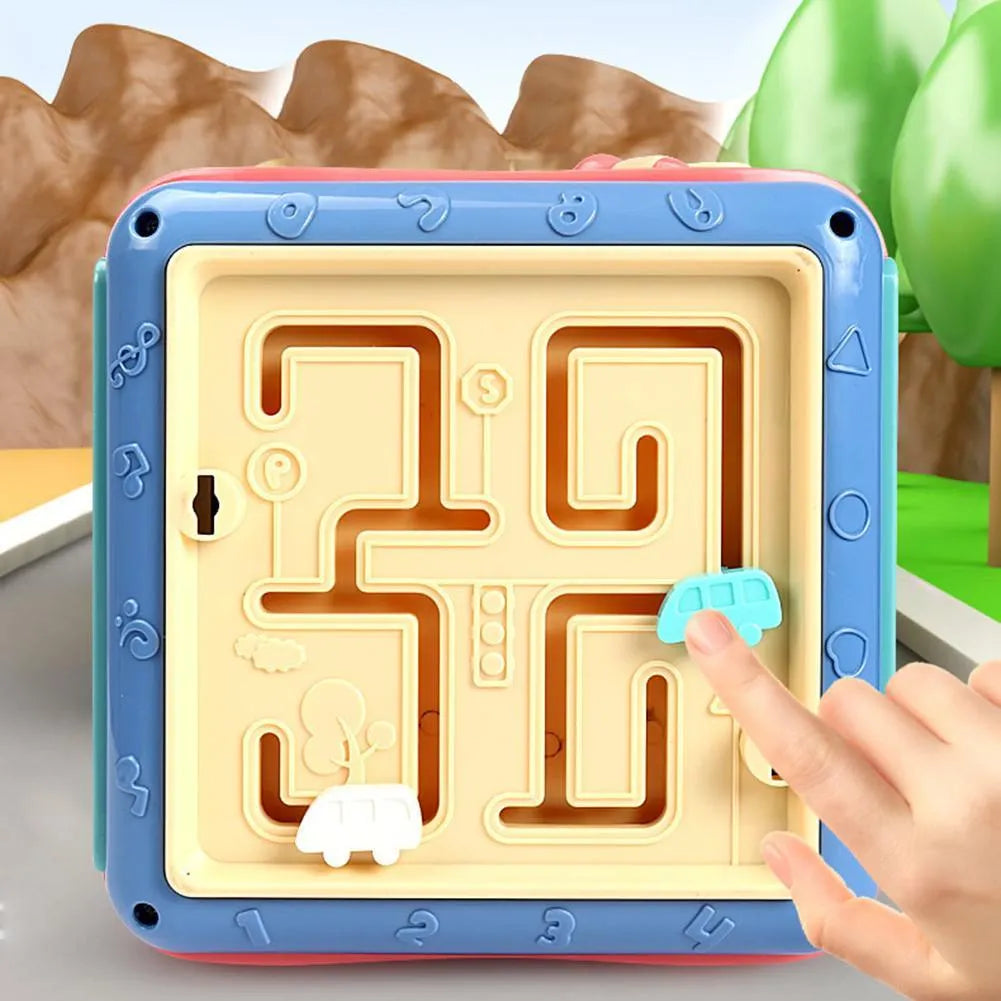 Colourful hexahedron educational toy with bead maze, gears, shape sorter, and clock face on different sides