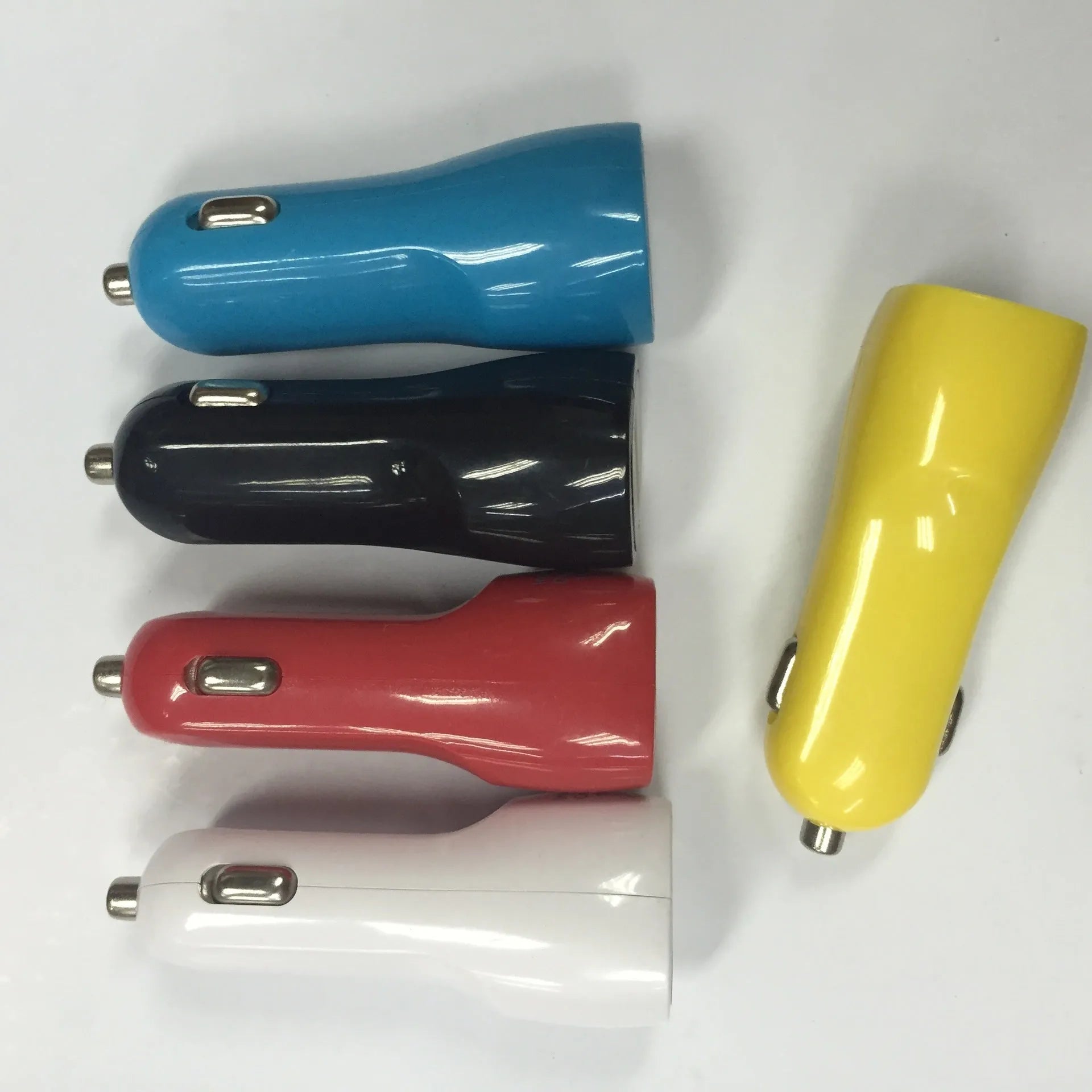 Duckbill‑shaped dual USB car charger with blue LED light, glossy black finish
