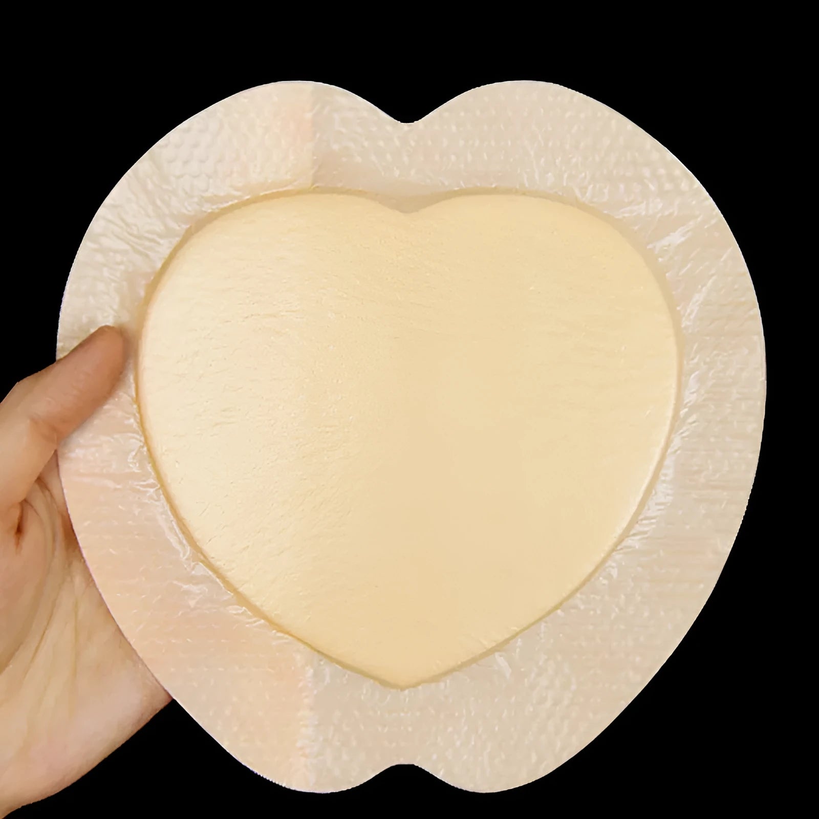 Skin-coloured silicone foam bedsore dressing for pressure injury prevention with neutral soft hardness