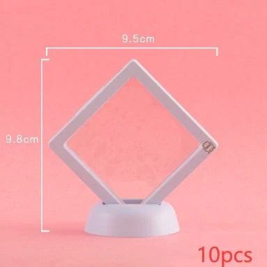 3D floating jewelry coin display stand in white and black, showcasing collectibles in mid-air