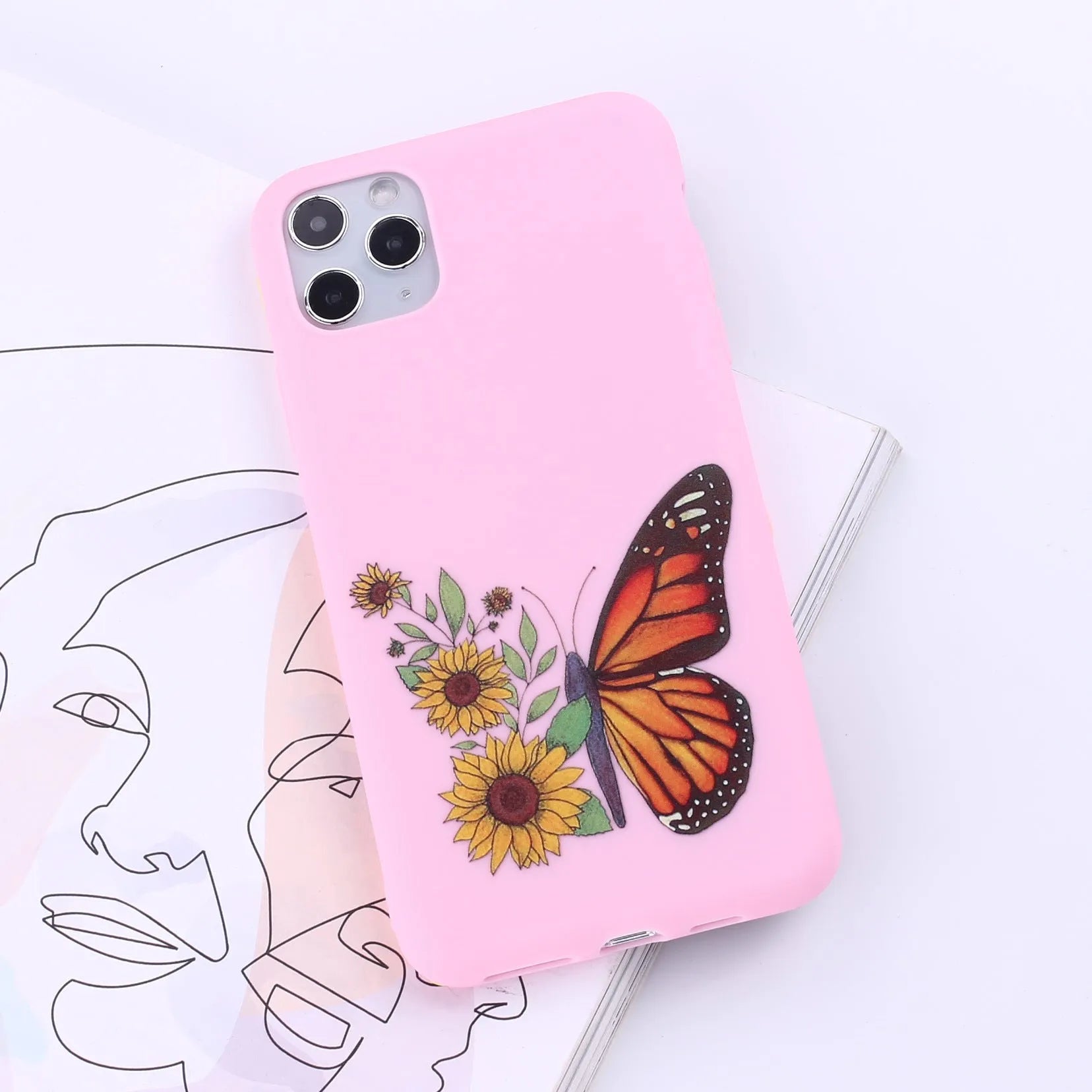 A selection of colourful TPU back cover cases for various Apple iPhone models.