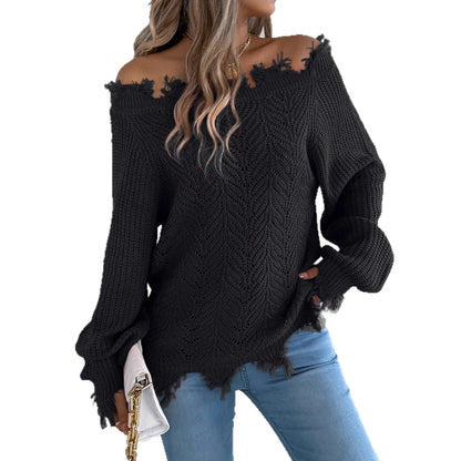 Women's black off-the-shoulder pullover sweater with hollow-out long sleeves on a hanger.