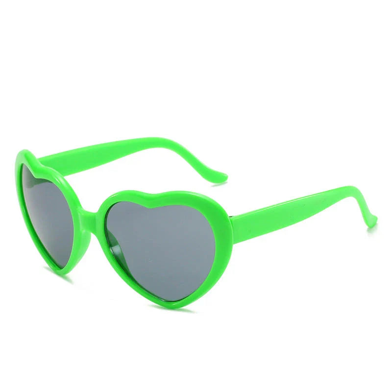 Fashionable heart-shaped light-up glasses with a built-in LED lighting system, perfect for adding a touch of love and playfulness to any occasion.