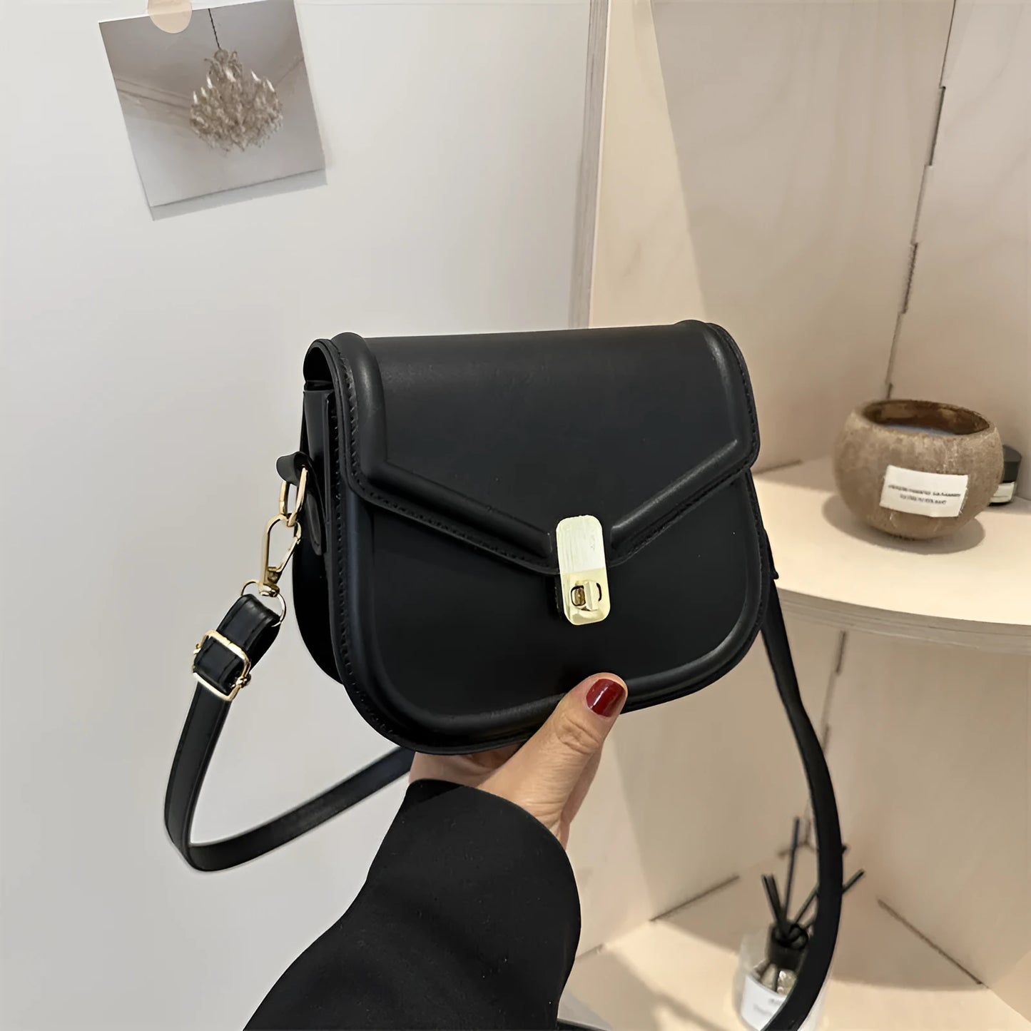 Soft PU leather messenger bag with textured finish in horizontal rectangular shape