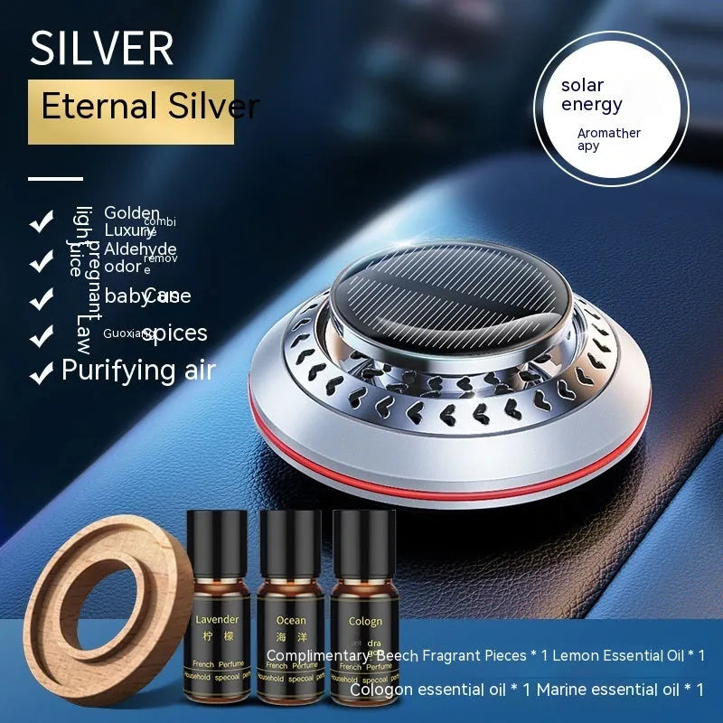 Solar-powered aluminium car air purifier with essential oil bottle and beech wood chips for odour removal.