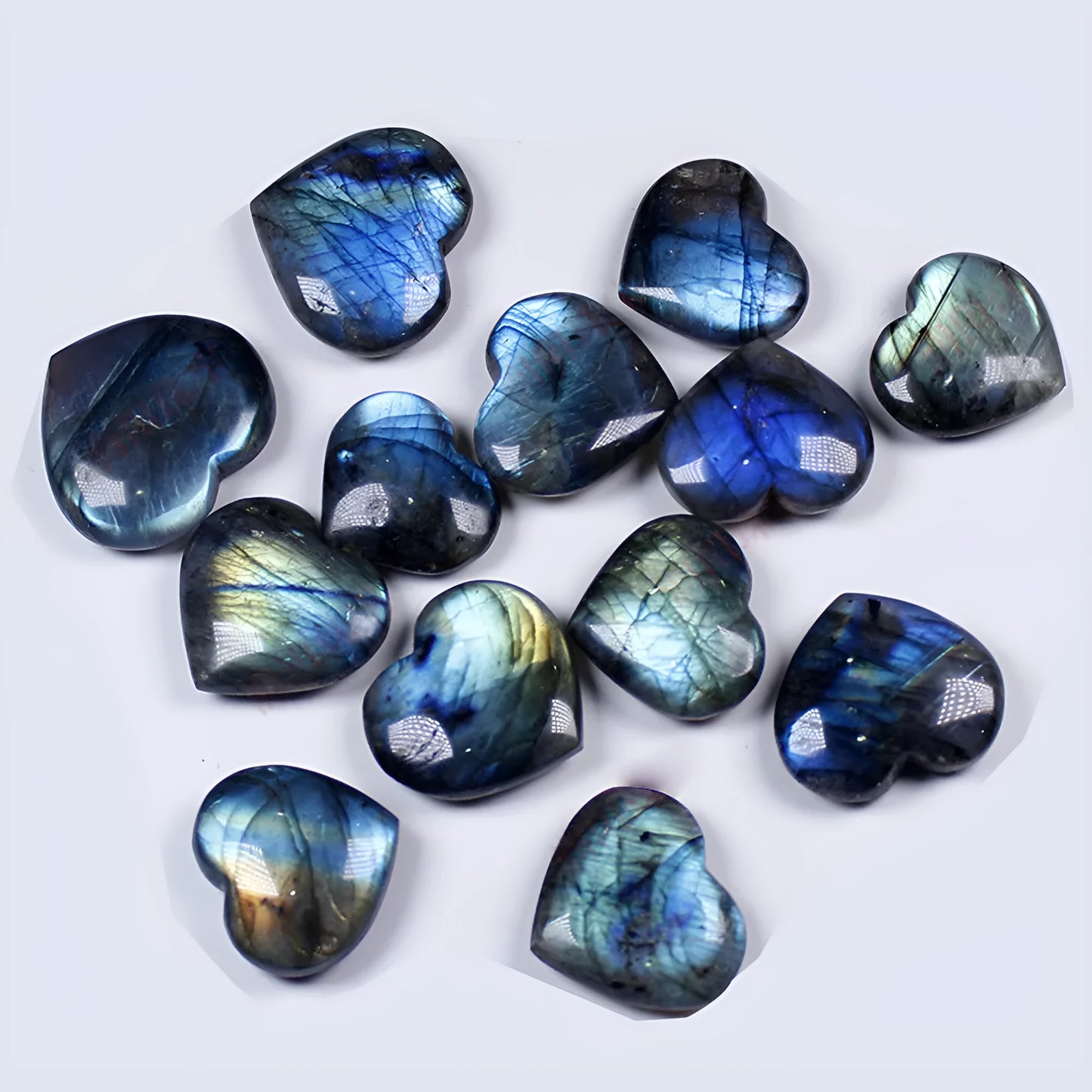 Natural pulled feldspar crystal heart pendant in ocean blue colour available in five sizes from 22mm to 45mm