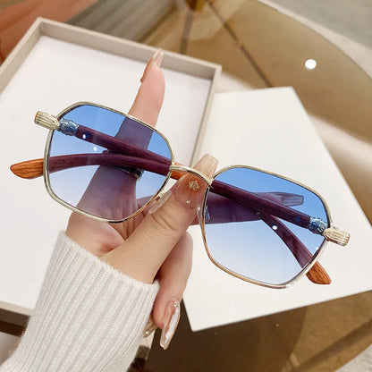 Women's frameless glasses with wood grain pattern and gold alloy frame in double blue colour.