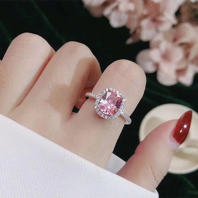 Women's silver colour alloy ring with artificial gemstone inlay and geometric design, bridal style.