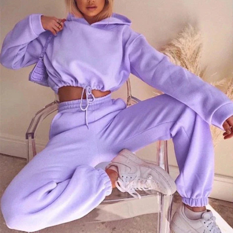 Stylish 2-piece athleisure sets for women in a variety of vibrant colors, including pink, purple, black, blue, and more.
