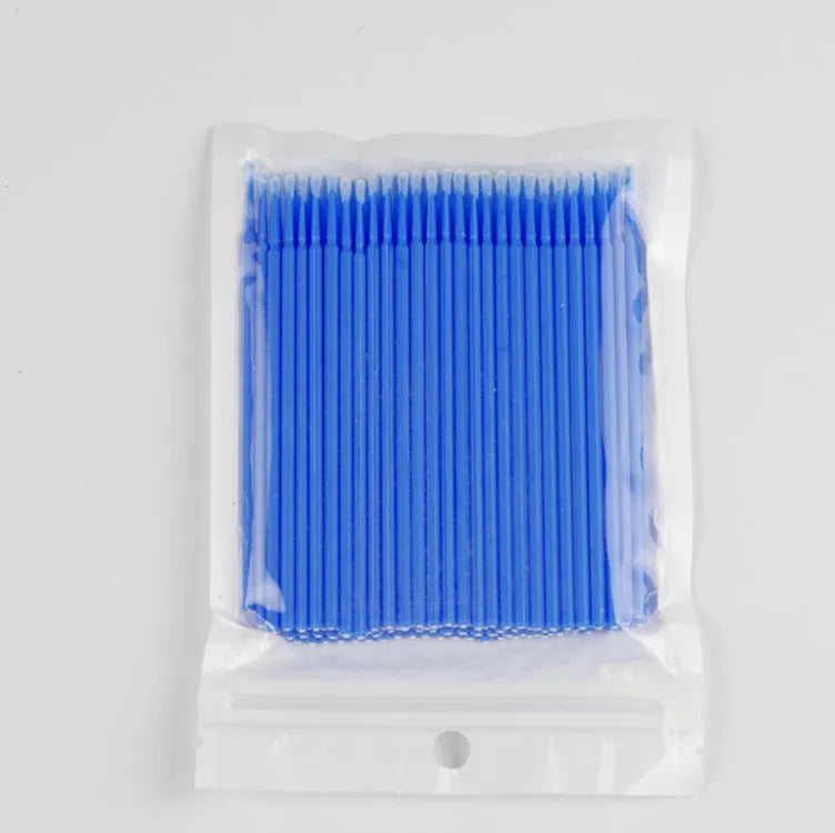 Disposable micro applicator brushes with coloured plastic handles and bendable cotton swab tips