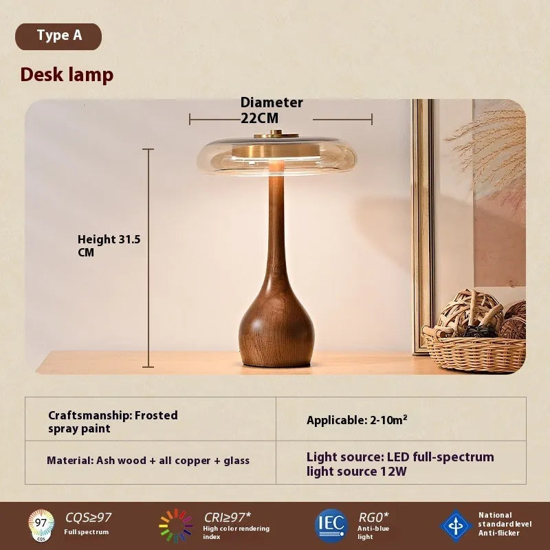 Solid wood Japanese retro style bedside lamp with a cognac-coloured hood on an ash wood base.