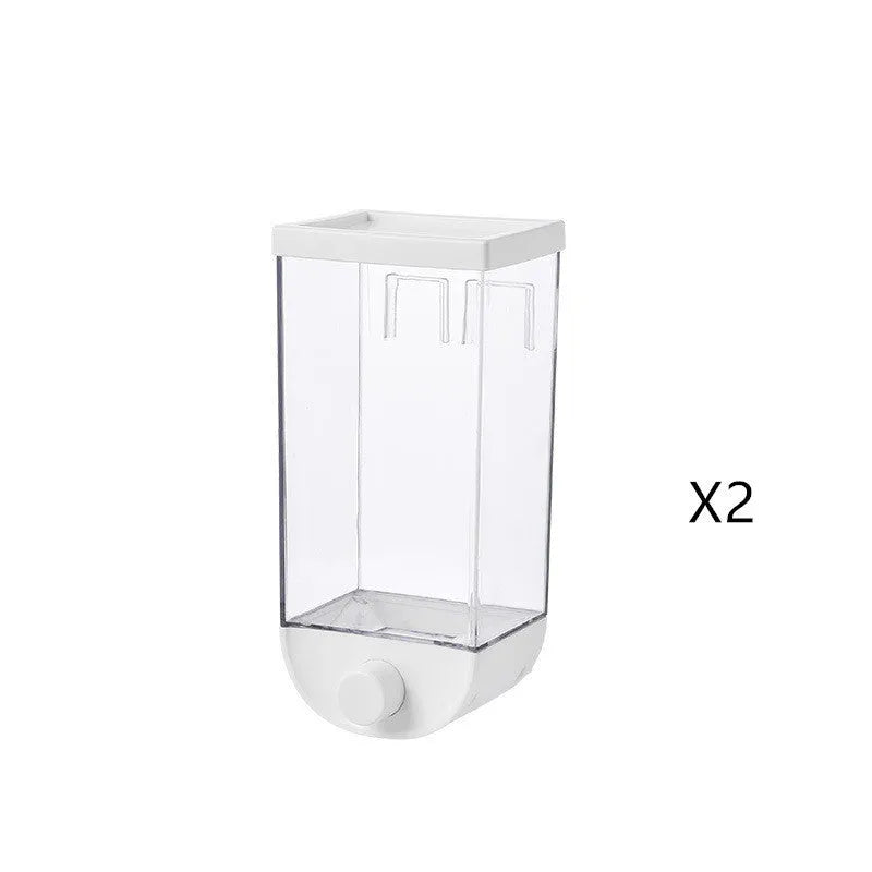 White wall-mountable kitchen food storage box with press lid dispenser, showing transparent body with cereal inside.
