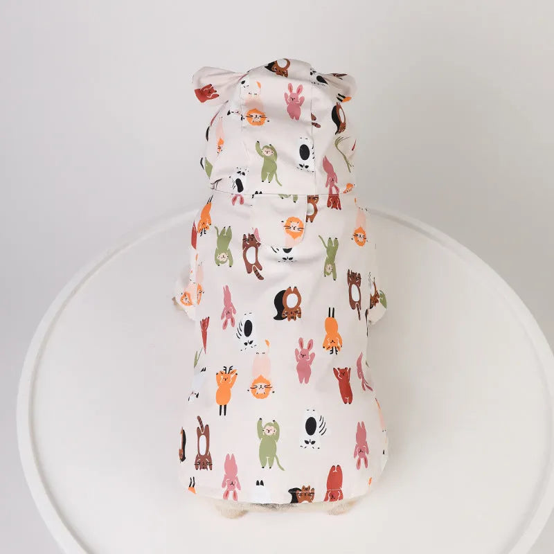Dog raincoat with cartoon print featuring double waterproof PU coating available in sizes S, M, L, XL, XXL for small to large dog breeds in two beige cartoon colour options