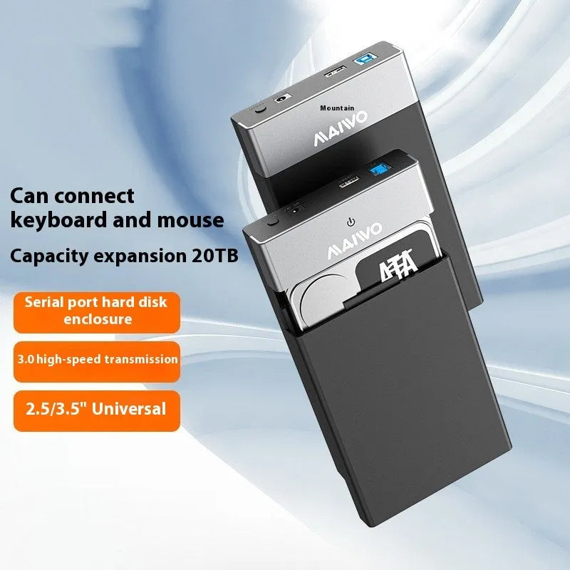 Black USB 3.0 SATA hard disk enclosure for 3.5-inch drives with slide cover open, showing connectors, alongside power supply and cable.