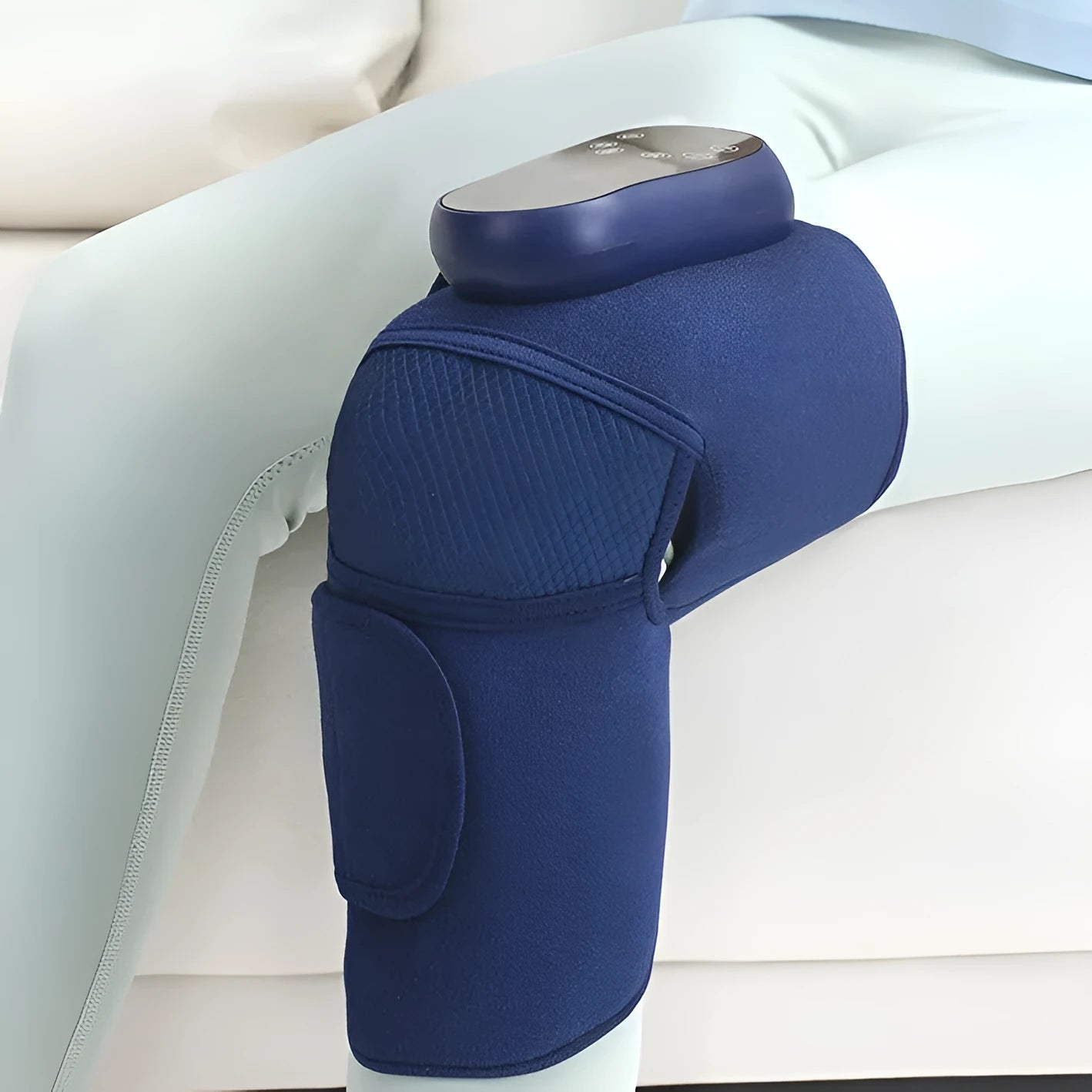 Blue self-heating knee massager showing airbag construction and control interface
