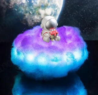 Enchanting cloud-inspired astronaut lamp with a rainbow-like glow, creating a mesmerising and whimsical atmosphere.