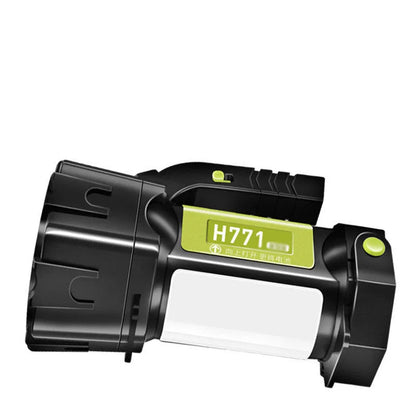 H771 portable LED searchlight in orange or green with shoulder strap and removable battery.