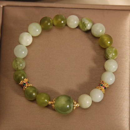 Original design jade bracelet in Xiuyan jade green colour, women's light luxury sweet Mori style jewellery.