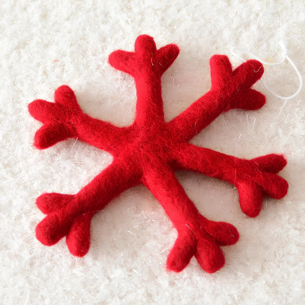 19cm wool felt snowflake and 13cm star Christmas decorations with intricate cut-out patterns